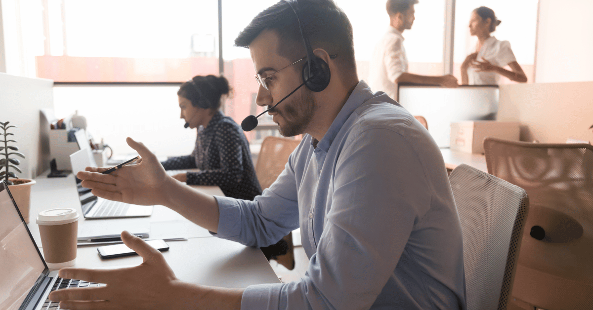 Outbound telemarketer talking to a customer